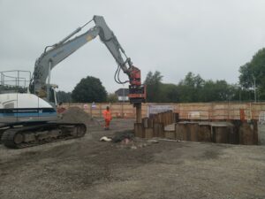 Image showing the movax inserting the new sheet piles at Riverstone Bridge