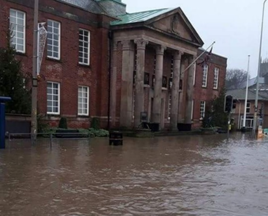 Flood waters covers the road alongside the Town Hall.